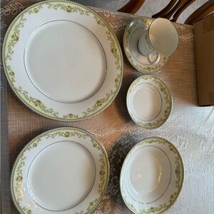 48 piece set of Raleigh pattern Noritake China along with add’l serving pieces